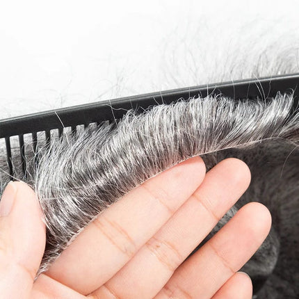 Toupet pour homme en cheveux naturels gris avec texture réaliste et finition soignée.