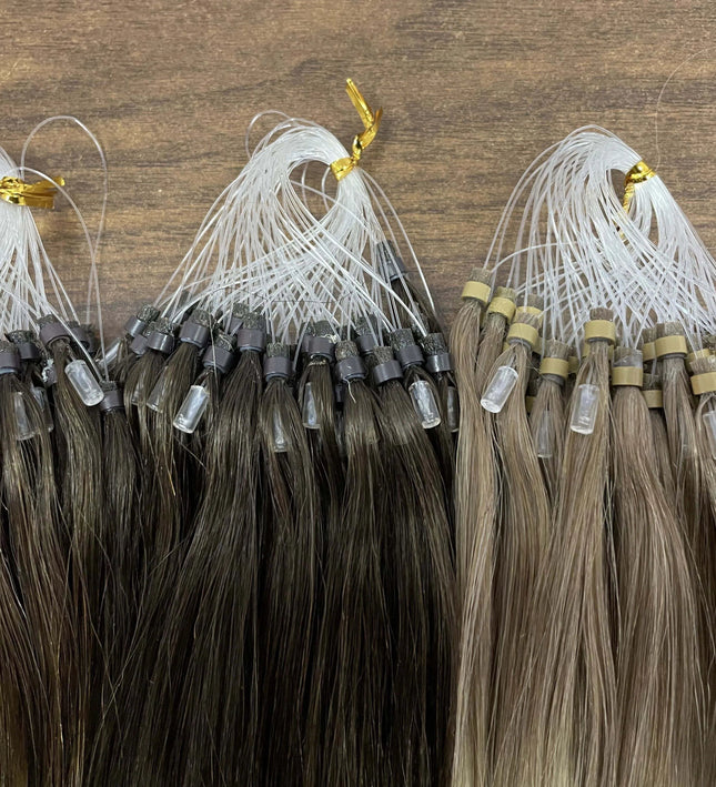 Extensions capillaires aux anneaux en cheveux naturels brun et blond pour un look élégant