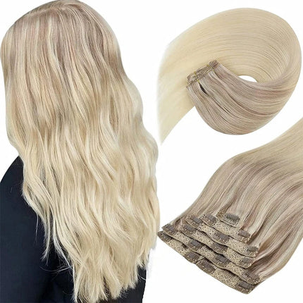 Extension de cheveux à clip ondulée couleur blond platine pour un look volumineux et élégant.