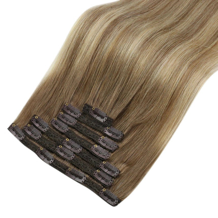 Extensions raides à clip couleur blonde naturelle pour cheveux longs et volumineux.