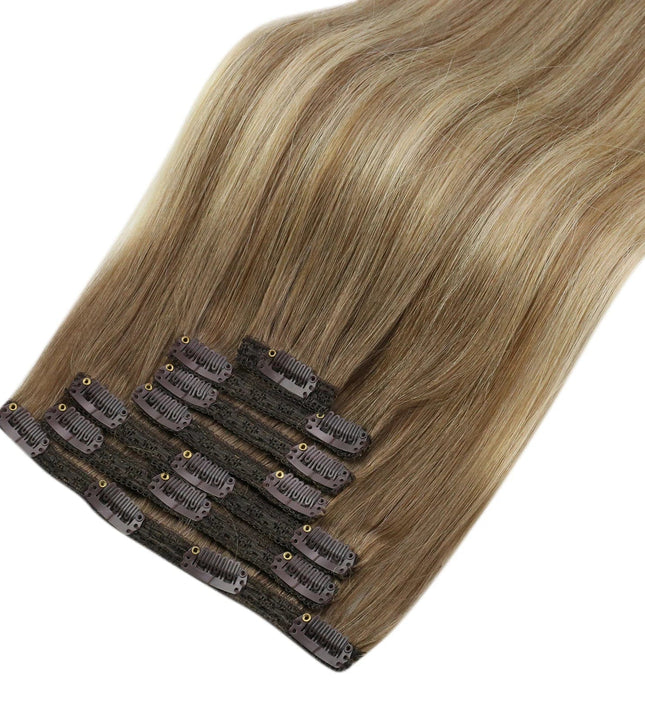 Extensions raides à clip couleur blonde naturelle pour cheveux longs et volumineux.