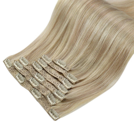 Extension clip-in cheveux naturels lisses couleur blond platine pour ajouter longueur.