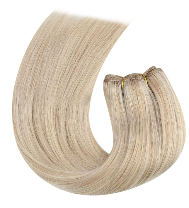 Extensions de cheveux longs raides en blond naturel pour une coiffure élégante et soignée