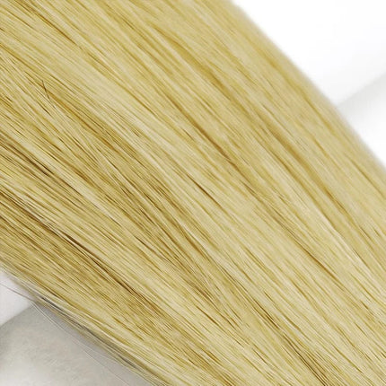 Tissage blond naturel pour une coiffure tressée longue et élégante