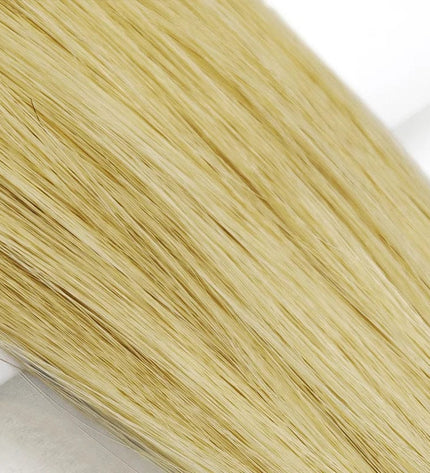 Tissage blond naturel pour une coiffure tressée longue et élégante