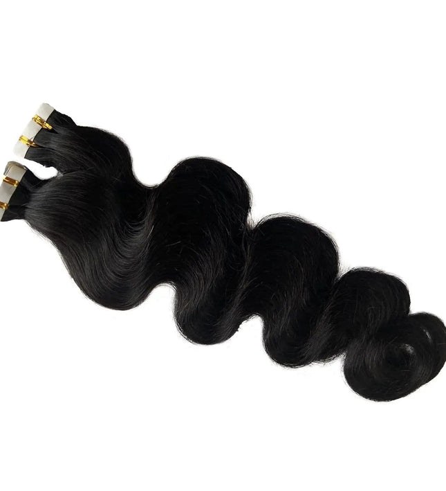 Extensions capillaires adhésives en cheveux noirs naturels ondulés pour un volume luxueux.