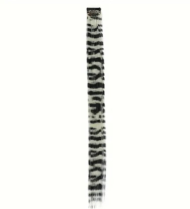 Extensions à clip en cheveux synthétiques motif zébré noir et blanc pour un look audacieux.