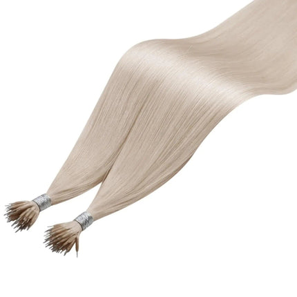 Extensions lisses en kératine couleur blond platine pour un look chic et naturel