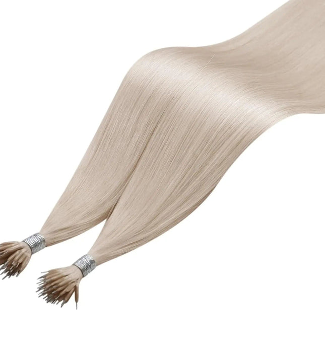 Extensions lisses en kératine couleur blond platine pour un look chic et naturel