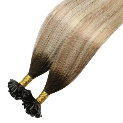 Extensions kératine couleur ombrée pour cheveux longs en mèches naturelles.