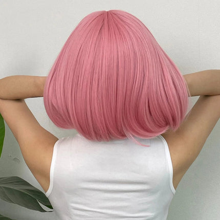 Perruque courte rose en cheveux synthétiques pour un look cosplay moderne et coloré