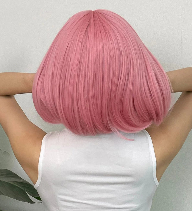 Perruque courte rose en cheveux synthétiques pour un look cosplay moderne et coloré