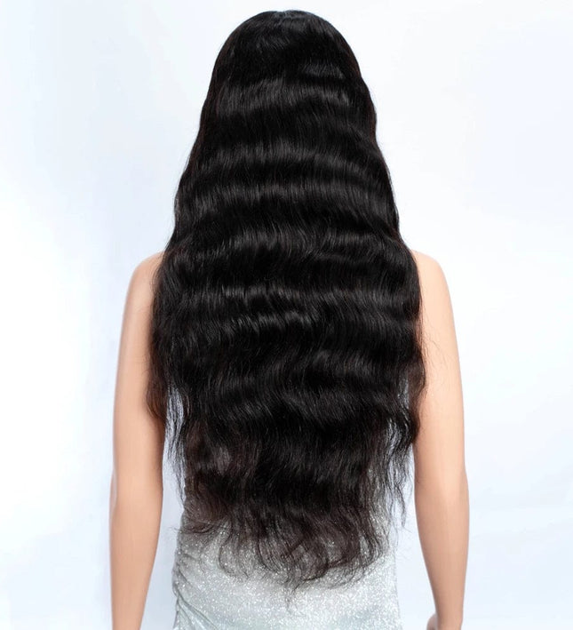 Perruque en cheveux naturels noire ondulée longue pour un style élégant et raffiné