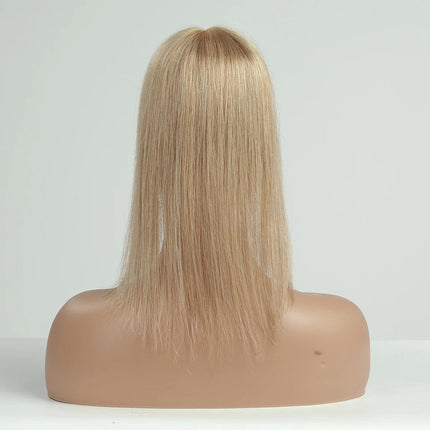 Postiche à frange cheveux naturels blond pour un look féminin et moderne