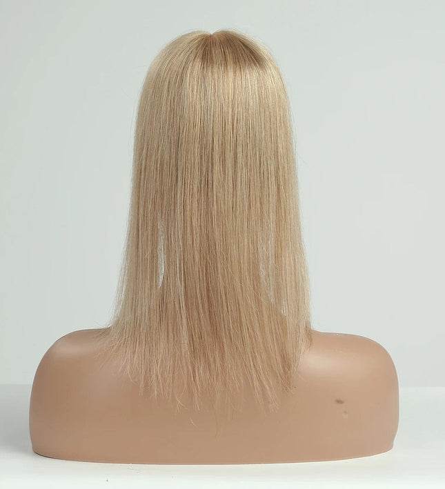 Postiche à frange cheveux naturels blond pour un look féminin et moderne