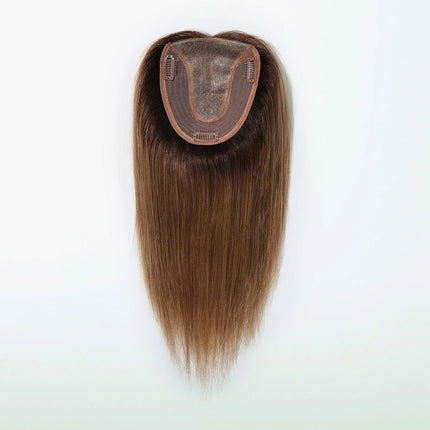 Toupet mi-long brun en cheveux naturels pour femme, pratique et élégant.